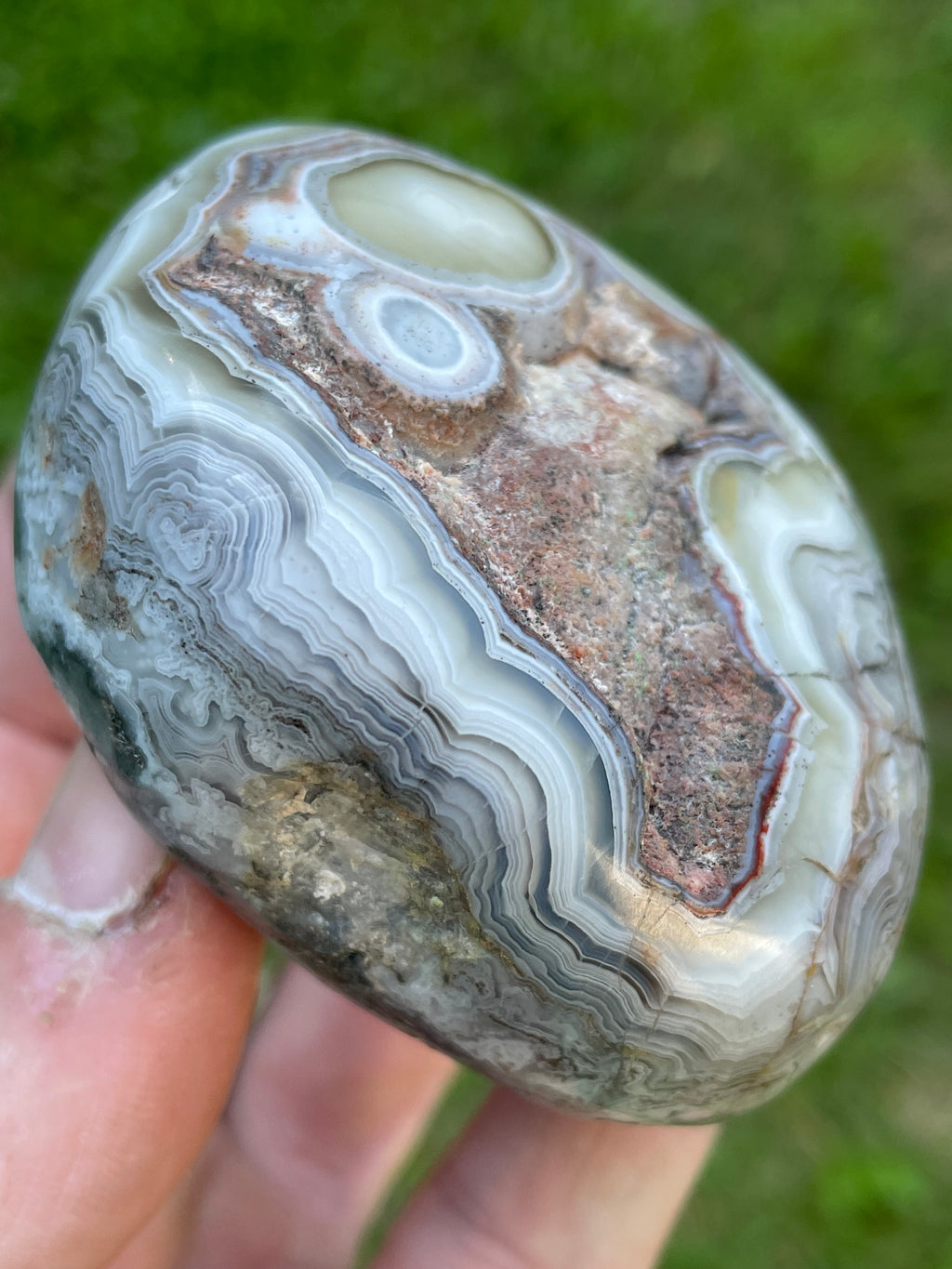 StoneBorn Creations Hand-Polished Lace Agate Freeform with Intricate Fortification Banding, Orbicular Eyes, Natural Matrix & Curved Display Face