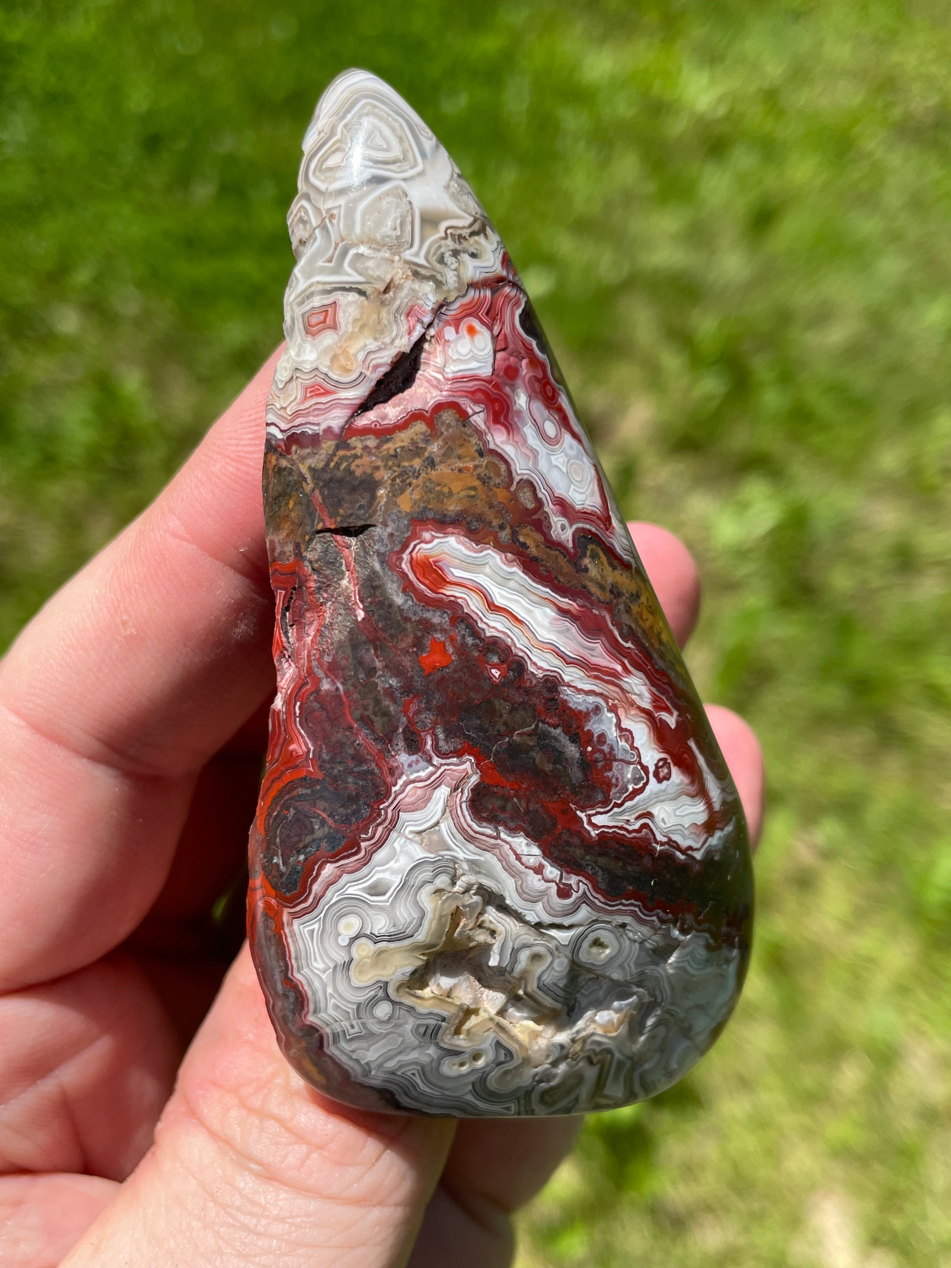 StoneBorn Creations Hand-Polished Lace Agate Freeform with Deep Crimson Banding, Intricate Fortification Patterns, and Natural Druzy Pocket