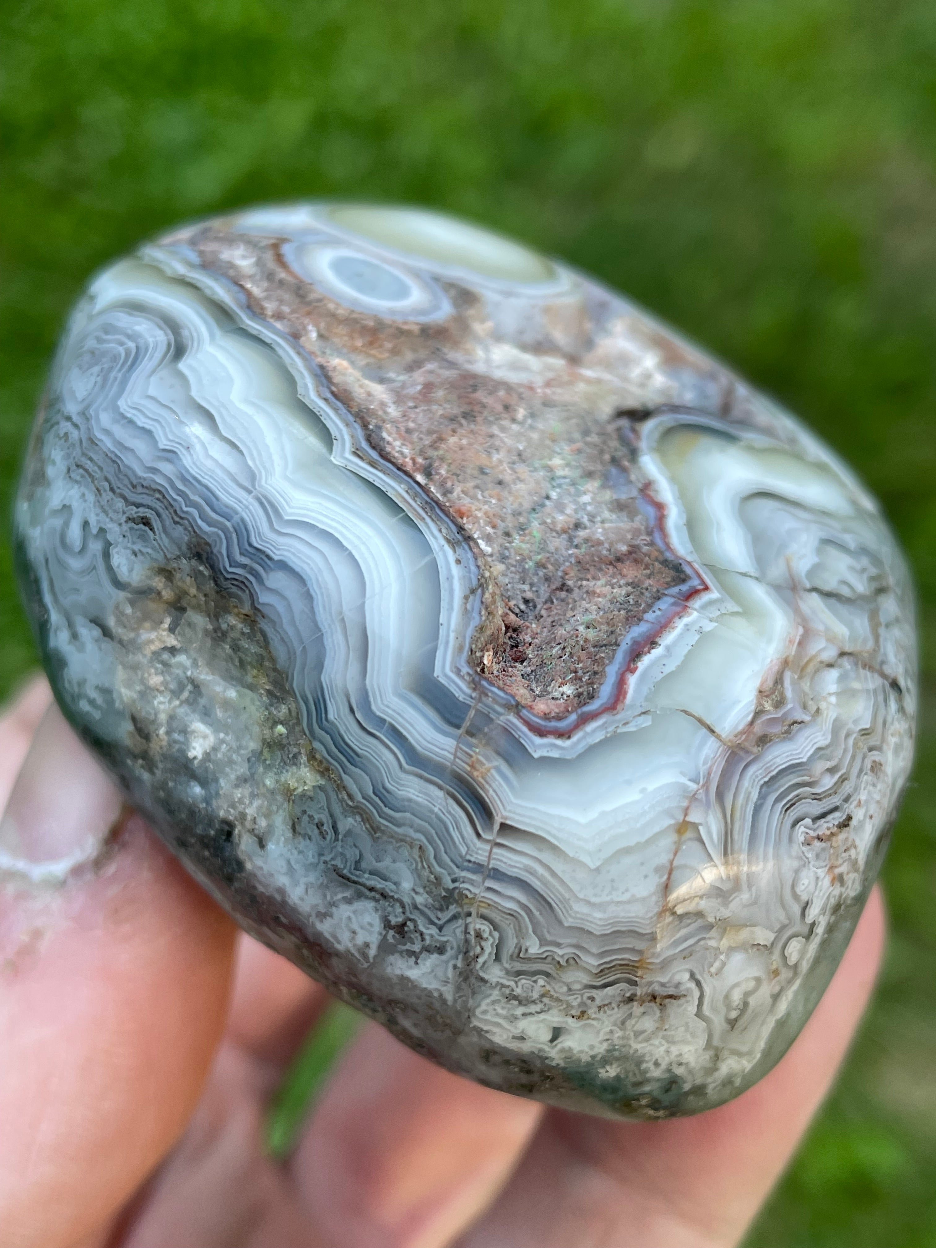 StoneBorn Creations Hand-Polished Lace Agate Freeform with Intricate Fortification Banding, Orbicular Eyes, Natural Matrix & Curved Display Face
