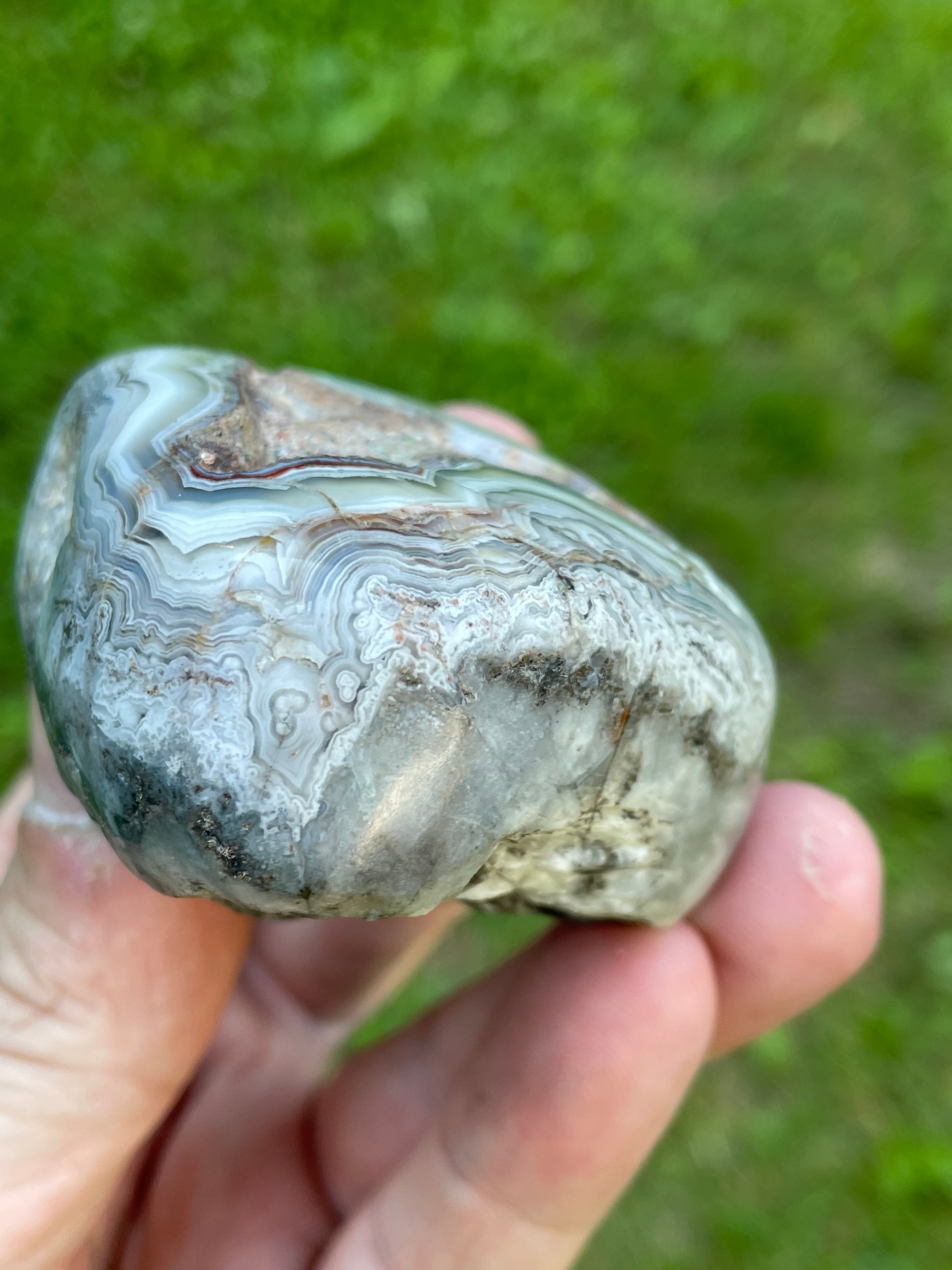StoneBorn Creations Hand-Polished Lace Agate Freeform with Intricate Fortification Banding, Orbicular Eyes, Natural Matrix & Curved Display Face
