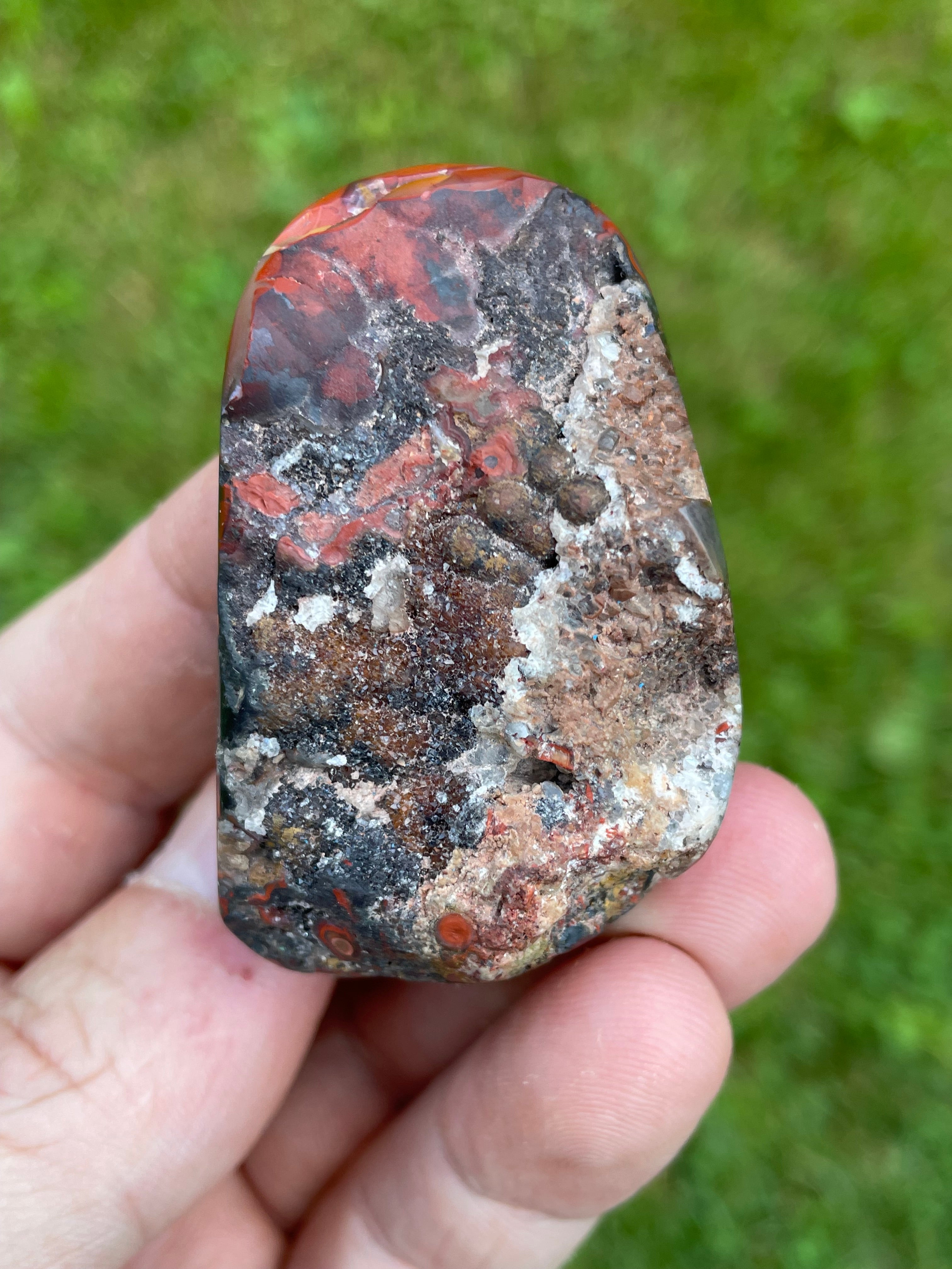 StoneBorn Creations Hand-Polished Lace Agate Freeform with Intricate Fortification Banding, Bold Red Plumes & Natural Druzy Matrix
