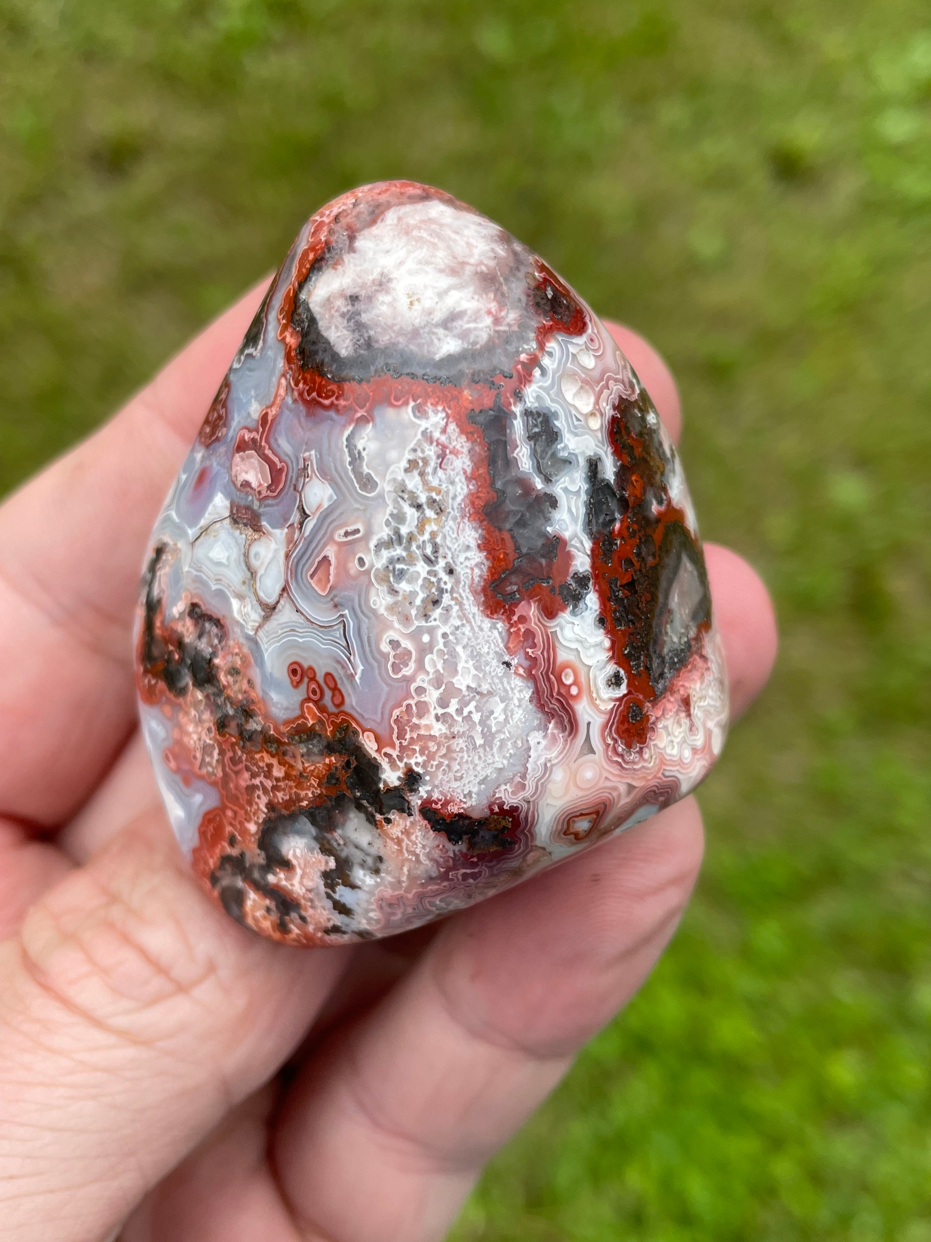 StoneBorn Creations Hand-Polished Lace Agate Freeform with Crimson Fortification Banding, Natural Druzy Cavities, and Intricate Orbicular Patterns