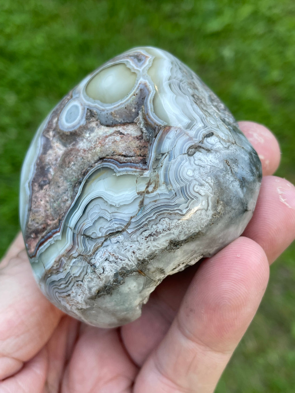 StoneBorn Creations Hand-Polished Lace Agate Freeform with Intricate Fortification Banding, Orbicular Eyes, Natural Matrix & Curved Display Face